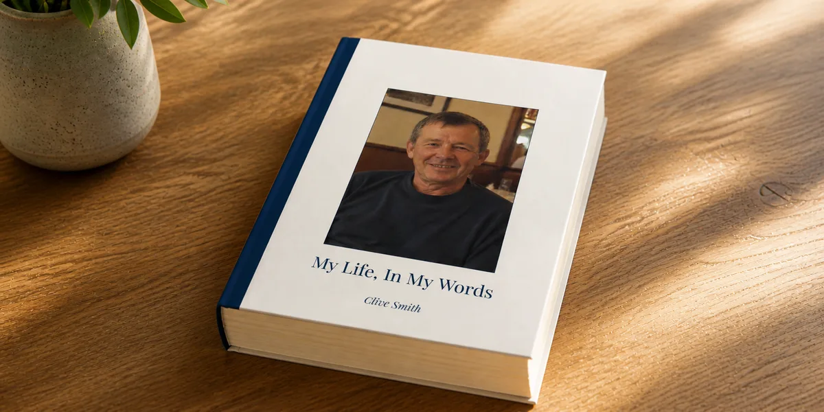 A hardback biography on a wooden table, titled My Life, In My Words